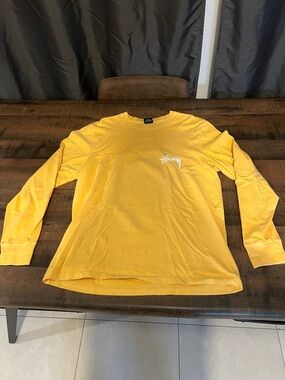 Stussy Yellow Crewneck Long Sleeve Tee with White Logo Tag